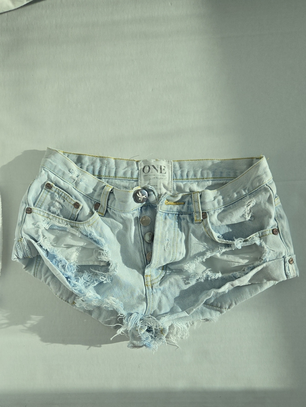 One Teaspoon Light Wash Distressed Denim Bandits
